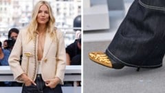 Sienna Miller überraschte in Cannes mit einer ausergewöhnlichen Schuh-Wahl. (Bild: Krone KREATIV/www.viennareport.at Vianney Le Caer/Invision/AP)