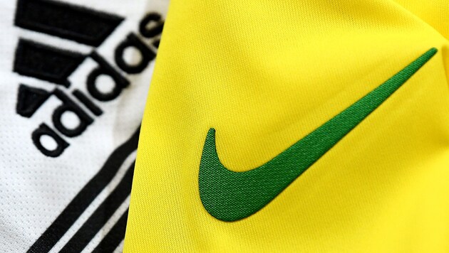 Adidas klagte Nike wegen Sporthosen mit Streifen. (Bild: APA/AFP/FRANCK FIFE)