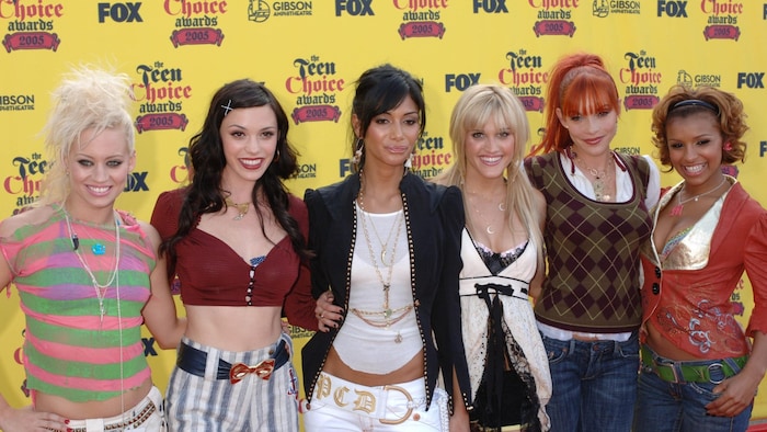 Nicole Scherzinger (center) with her bandmates from the Pussycat Dolls