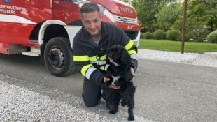 „Sascha“ mit einem seiner Retter.