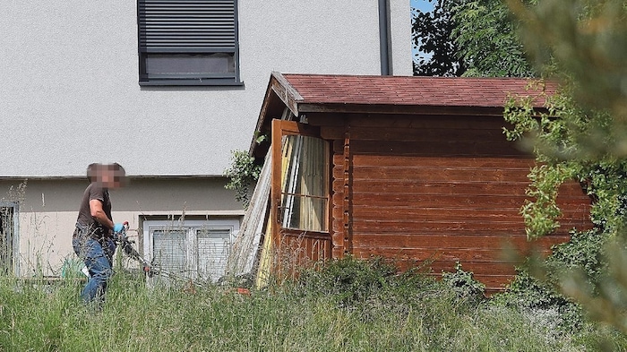 Detectives secured evidence in the 55-year-old's garden.