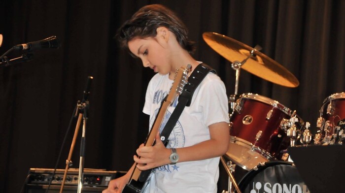 His passion for music was kindled at a young age.