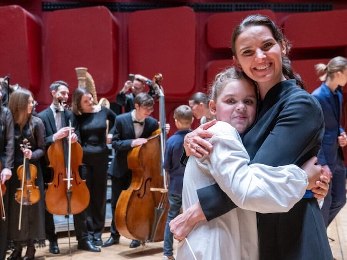 The Ukrainian Youth Symphony Orchestra and Oksana Lyniv at a charity concert in Strasbourg.