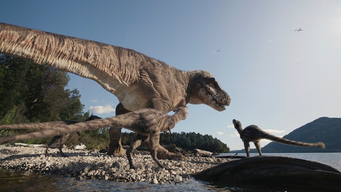 Künstlerische Darstellung: Ein T. rex mit Jungtieren