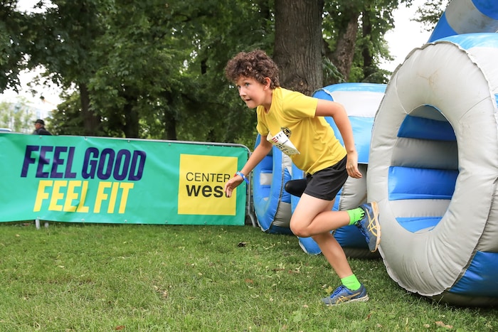 Before the adults get started, the little ones sprint through the city.