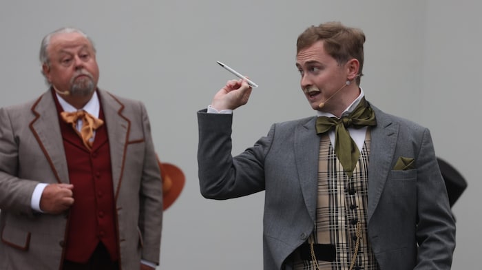Roman Leobacher, in the foreground, plays eccentric Fogg, who sets himself an ambitious goal.