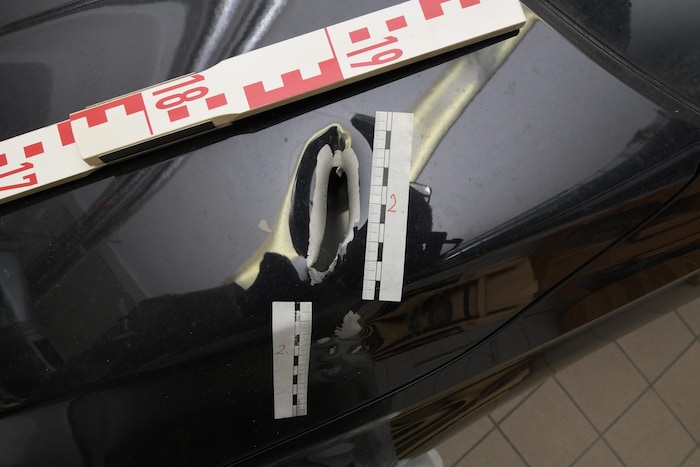 A powerful blow also hit the police car.