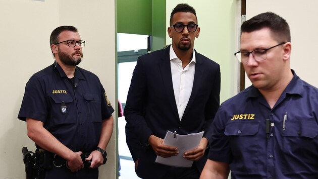 Which sponsor wants to see such pictures? Boateng surrounded by court officials!