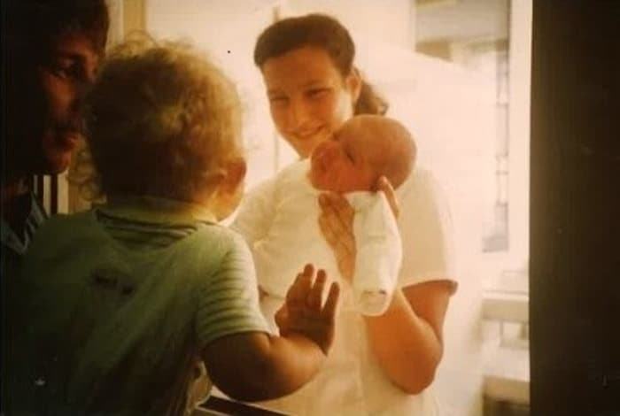 In the past, newborns were still presented to their mothers through a window