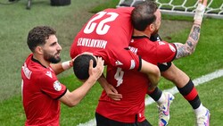 Georgien bejubelt den ersten Punkt bei einer EM-Endrunde.