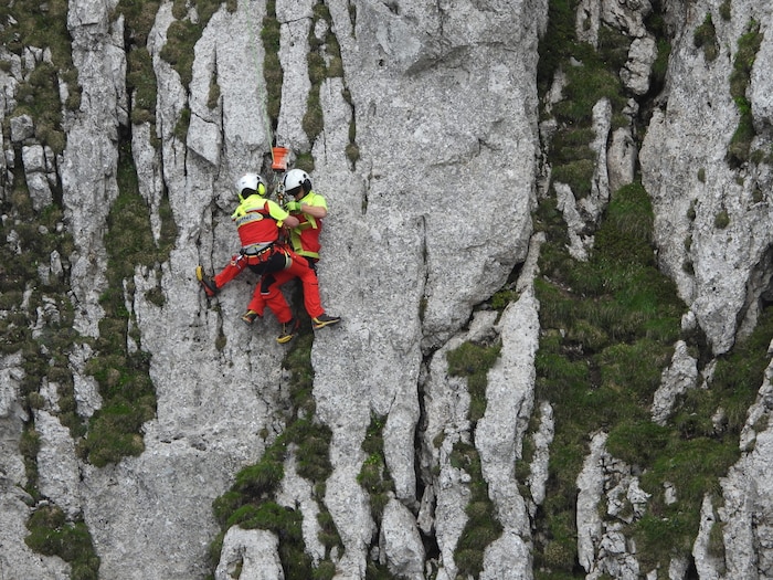 Every move has to be perfect during the "capper rescue" on the rock face.