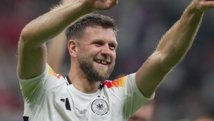 Niclas Füllkrug ist glücklich.