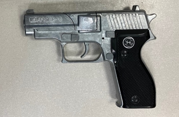 The two teenagers are said to have been threatened with this blank-firing pistol.