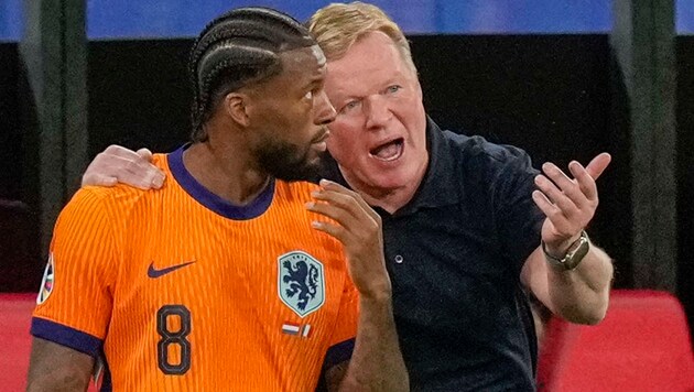 Ronald Koeman and Georginio Wijnaldum (Bild: Copyright 2024 The Associated Press. All rights reserved)