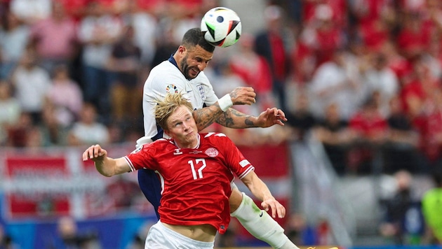 Kyle Walker (o.) fährt bei der EURO „zweigleisig“. (Bild: AFP/AFP or licensors)