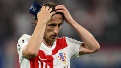 Luka Modric ist nach dem Drama gegen Italien enttäuscht.  (Bild: APA/AFP/Christophe SIMON)