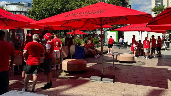 Austria's supporters are slowly arriving at Berlin's Breitscheidplatz and will once again ...