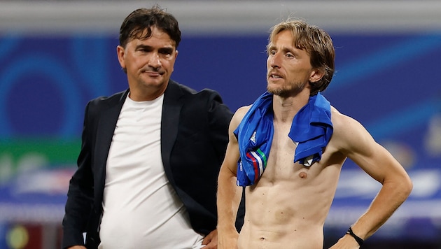 Zlatko Dalic (links) und Luka Modric sind nach dem Remis gegen Italien bitter enttäuscht.  (Bild: AFP/APA/Odd ANDERSEN)