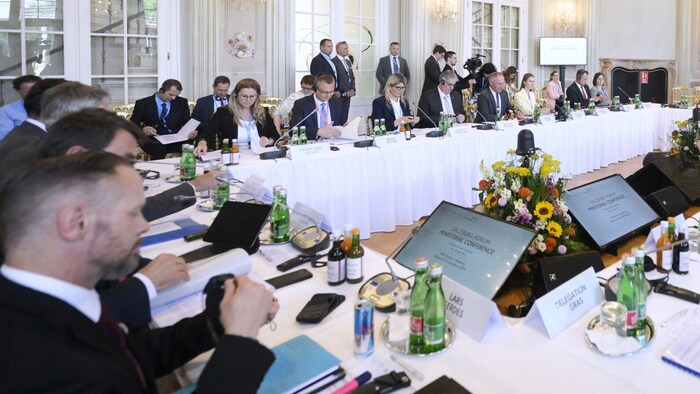 The politicians in the meeting room