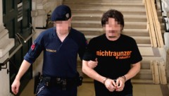 Der Rumäne wird aus der U-Haft vorgeführt. Sein T-Shirt entpuppt sich schnell als Selbstironie. (Bild: Bissuti Kristian/Kristian Bissuti, Krone KREATIV)