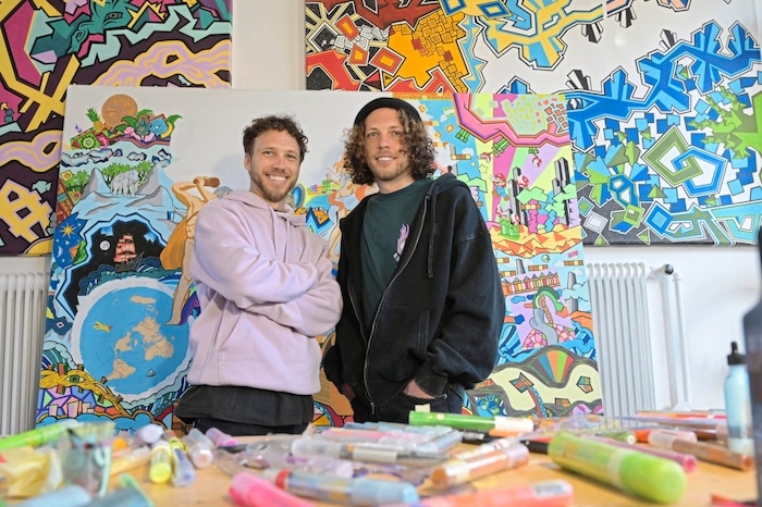 The artist twins Rachlé appreciate the atmosphere in the art space.