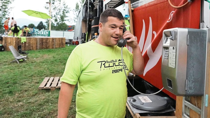 A great team: Daniel and his buddies even have a phone booth with them