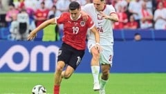 Christoph Baumgartner (li.) spielt bei der EURO mit Österreich groß auf. (Bild: AFP/AFP or licensors)