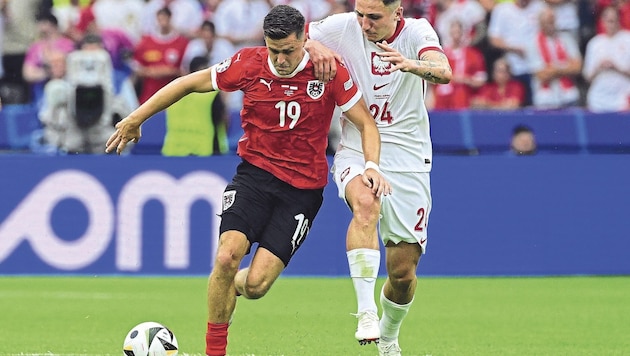 Christoph Baumgartner (li.) spielt bei der EURO mit Österreich groß auf. (Bild: AFP/AFP or licensors)