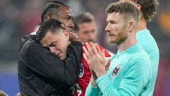 Die Enttäuschung bei den Spielern der österreichischen Fußball-Nationalmannschaft ist groß. (Bild: AP ( via APA) Austria Presse Agentur/ASSOCIATED PRESS)