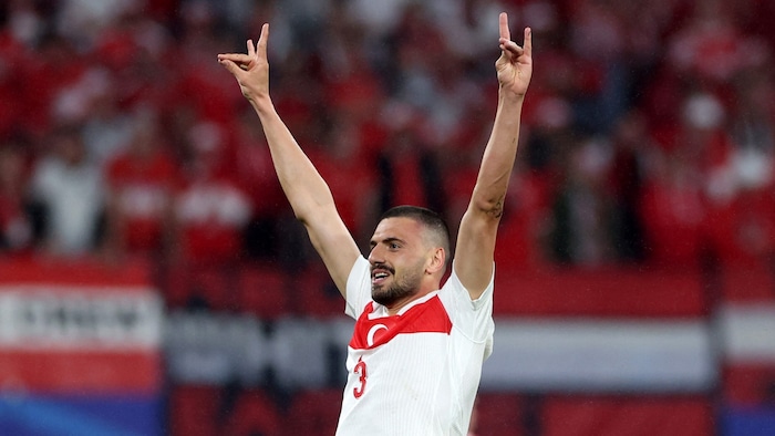 Merih Demiral shows the wolf salute while celebrating a goal against Austria.