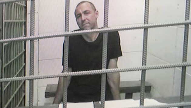 The arrested Laurent Vinatier during a hearing (Bild: APA/AFP/Andrey BORODULIN)