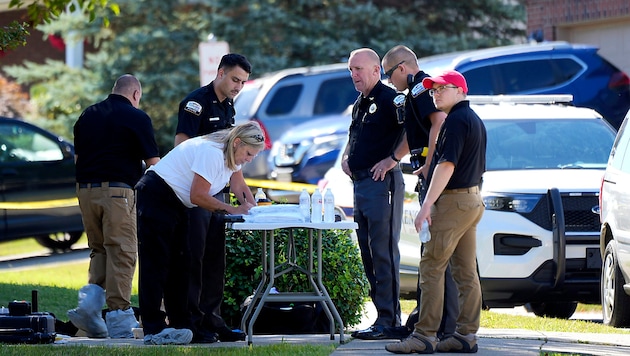 Crime scene work after the bloody party (Bild: APA/AP)