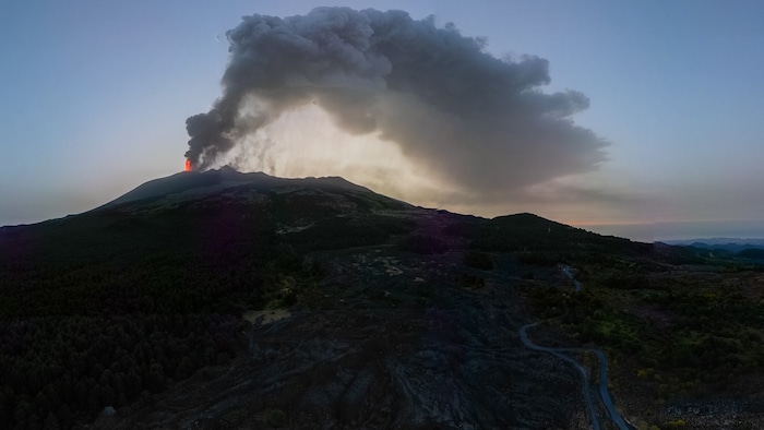 A high column of smoke had formed over Mount Etna.