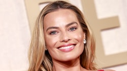 Margot Robbie ist Medienberichten zufolge zum ersten Mal schwanger. (Bild: APA/AFP/Michael TRAN)