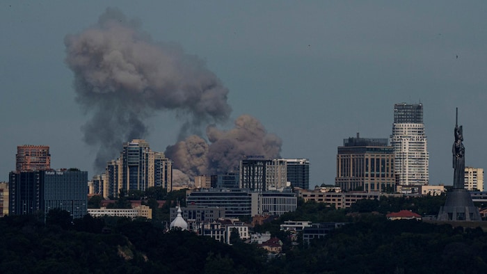 Smoke rises over Kiev.