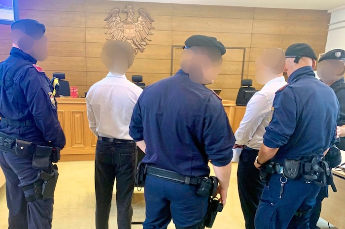 White shirt, dark pants, clean sneakers - but the two "model boys" had to answer for murder and aggravated robbery resulting in death.