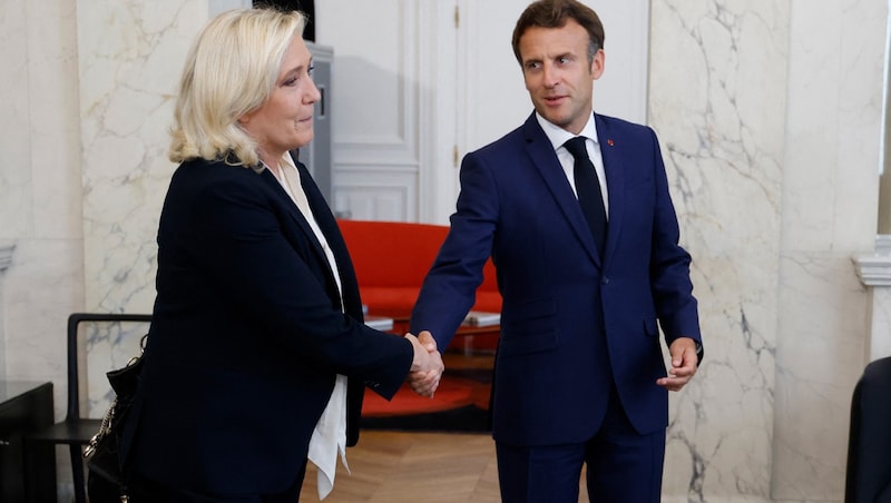 Fransa'daki daimi siyasi rakipler: Cumhurbaşkanı Macron ve en azılı rakibi Le Pen (Bild: AFP/POOL/LUDOVIC MARIN)