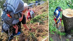 Mit dem dreijährigen Kind auf dem Rücken ging es talwärts. Im schwierigen und steilen Gelände mussten die Helfer auf das Abseilen zurückgreifen. (Bild: ZOOM Tirol/Krone KREATIV)