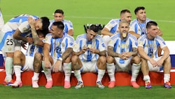 Die Argentinier nach ihrem Sieg im Copa-Finale gegen Kolumbien. (Bild: AFP/APA/CHARLY TRIBALLEAU)