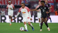 Xavi Simons (links) und Kingsley Coman spielen in den Transfer-Auseinandersetzungen zwischen Bayern und PSG eine wesentliche Rolle.  (Bild: AFP/APA/Ronny HARTMANN)