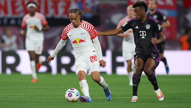 Xavi Simons (links) und Kingsley Coman spielen in den Transfer-Auseinandersetzungen zwischen Bayern und PSG eine wesentliche Rolle.  (Bild: AFP/APA/Ronny HARTMANN)