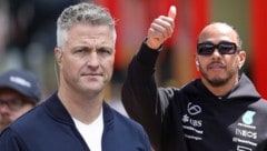 Lewis Hamilton (rechts) sieht das Outing von Ralf Schumacher als wichtiges Signal.   (Bild: APA/ERWIN SCHERIAU, ASSOCIATED PRESS)