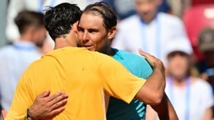 Rafael Nadal (re.)