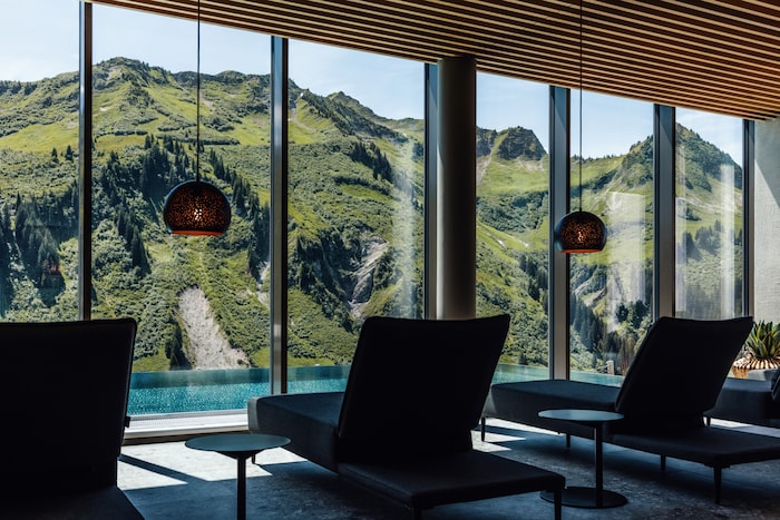 Relax by the infinity pool at the Genießerhotel Alpenstern