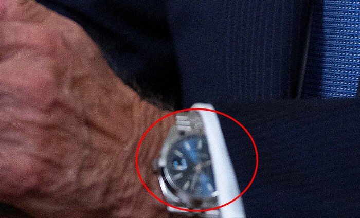 It is just after 8 pm on Biden's wristwatch.