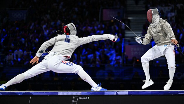 Oh Sang-uk (left) snatched the gold medal. (Bild: AFP/Fabrice COFFRINI)