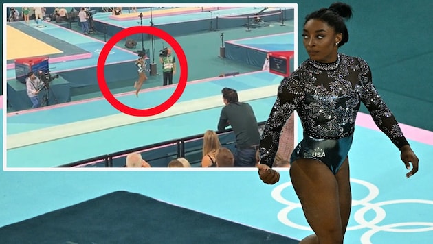 Simone Biles humpelte beim Aufwärmen. Besteht Grund zur Sorge? (Bild: AFP/APA/Lionel BONAVENTURE)