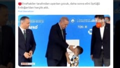 Der türkische Präsident Recep Tayyip Erdoğan (Mitte) mit einem Buben (Bild: x.com/dokuz8haber)