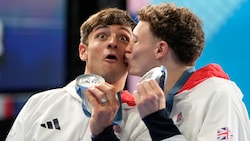 Thomas Daley (links) holte mit Noah Williams am Montag die Silbermedaille. (Bild: AP ( via APA) Austria Presse Agentur/ASSOCIATED PRESS)