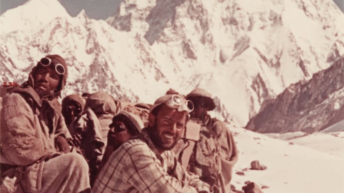 Abram with some porters. They hauled tons of equipment up the mountain. 